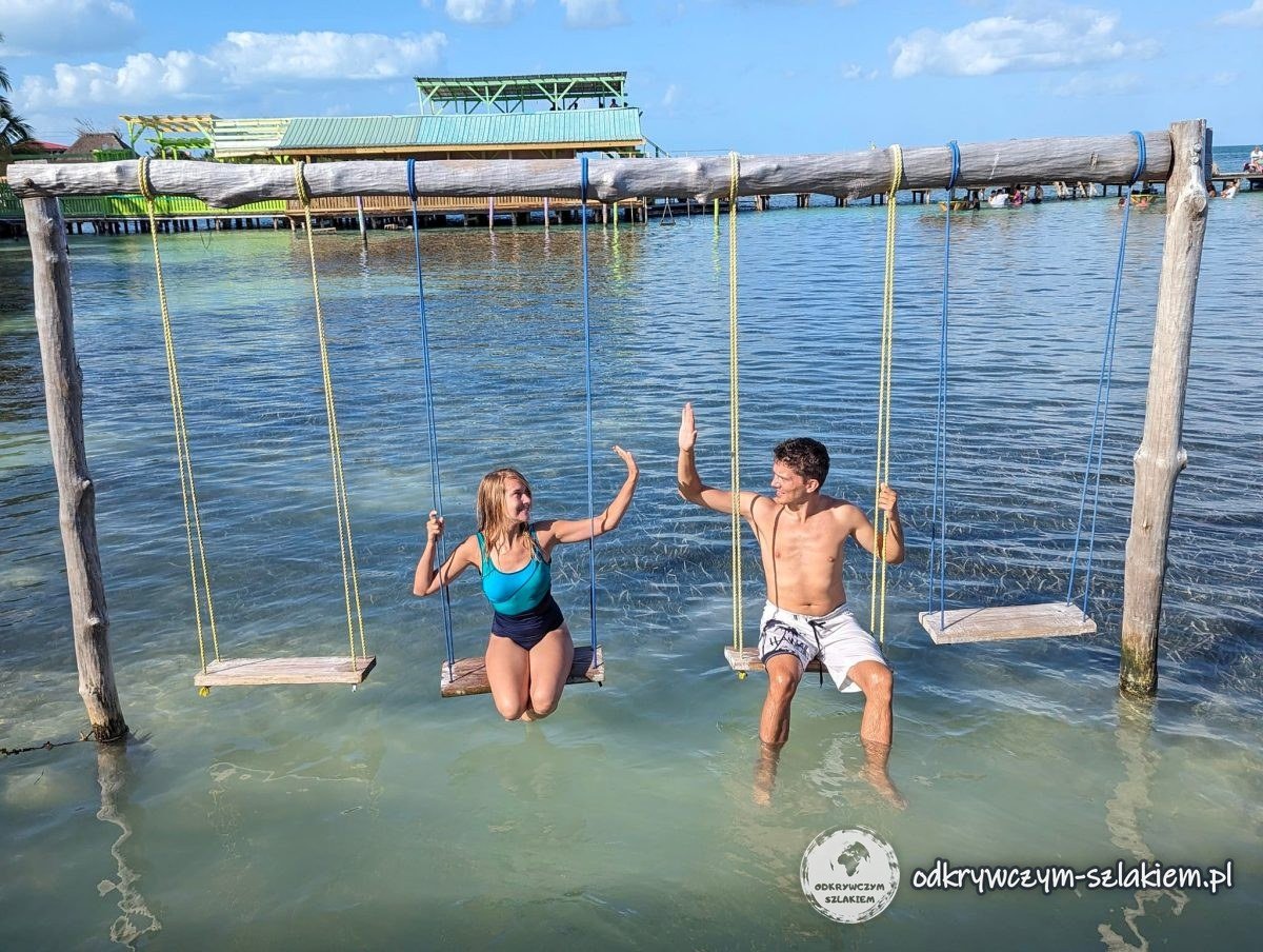 Swings in turquoise water on the island of Caye Caulker, Belize