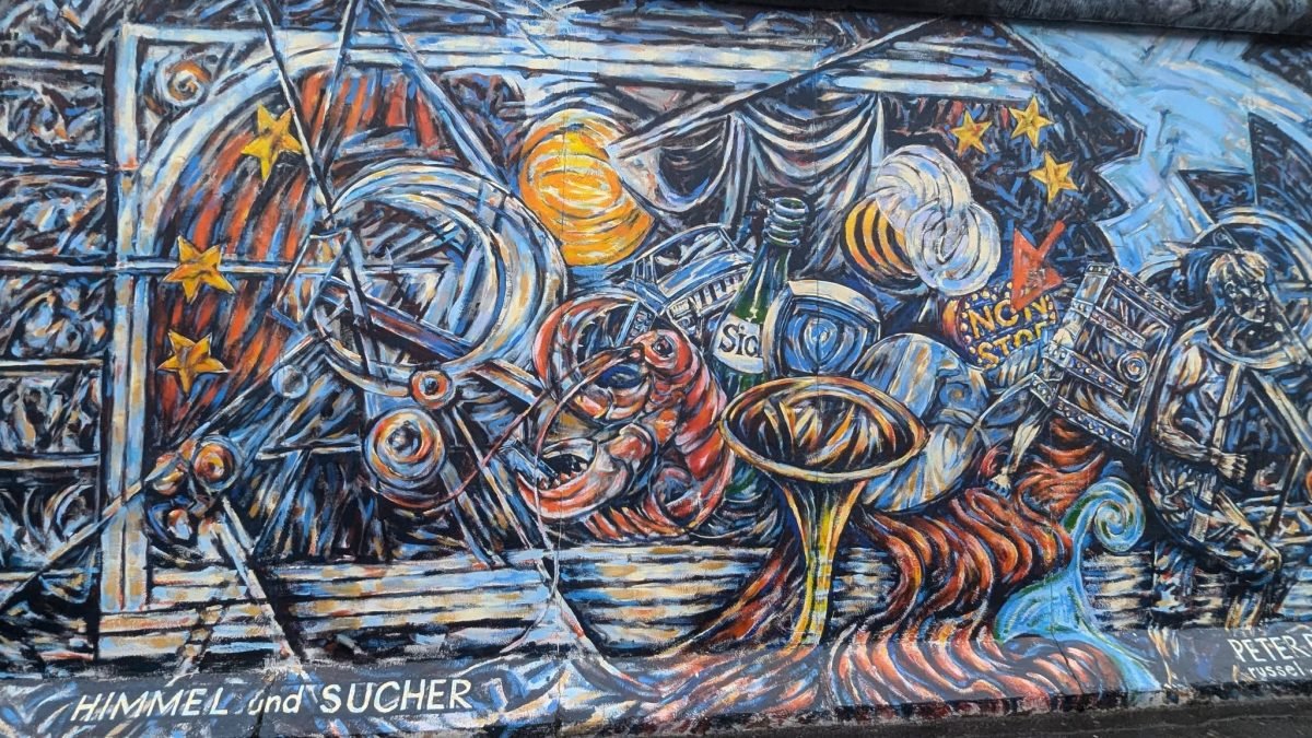 Kolorowy mural „Himmel und Sucher” na East Side Gallery