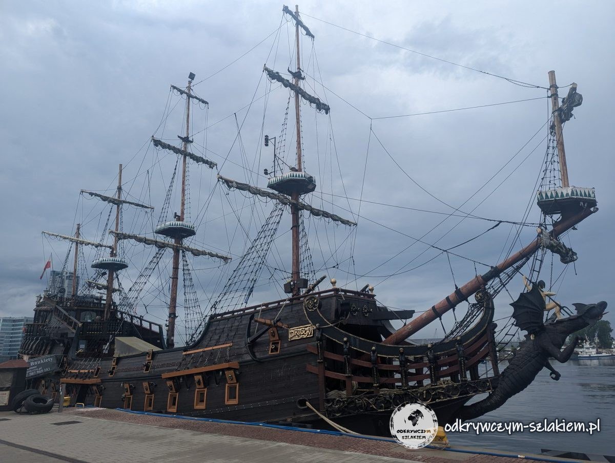 The tourist ship Dragon styled as a galleon, with a dragon figurehead on the bow, at the quay in Gdynia