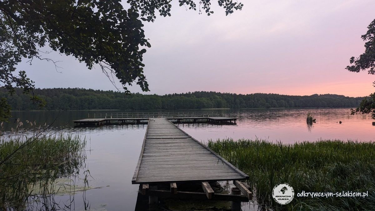 A jetty on Lake Kortowskie at sunset