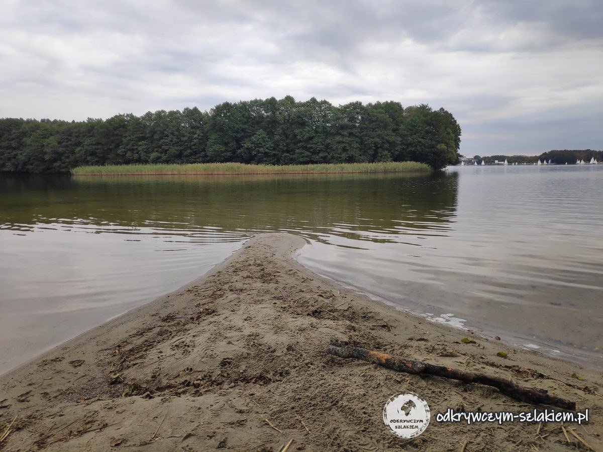 A sandy spit reaching into Lake Ukiel by Lwia Paszcza bay on a cloudy day