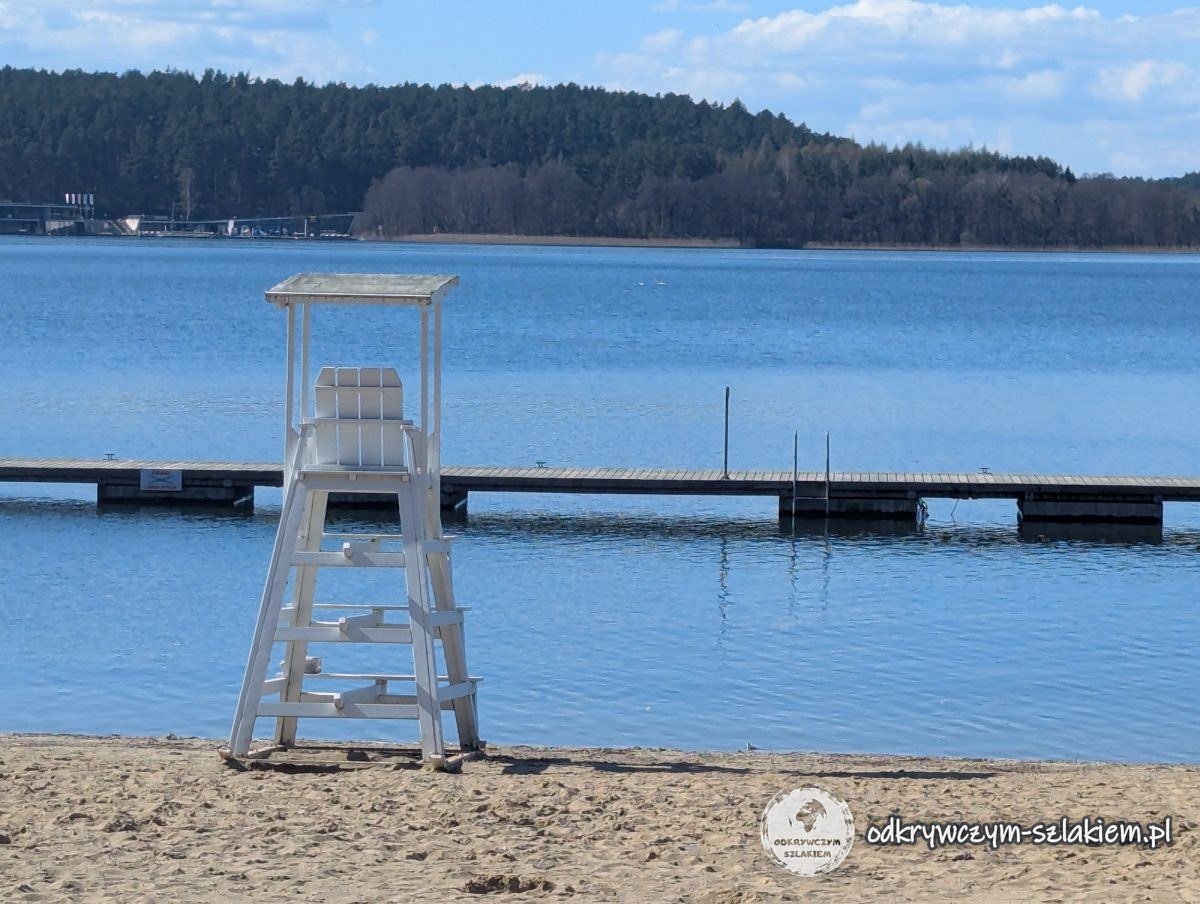 The city beach on Lake Ukiel with a lifeguard tower and a pier in April