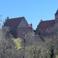 The Castle of the Warmian Chapter in Olsztyn above the Łyna valley in spring