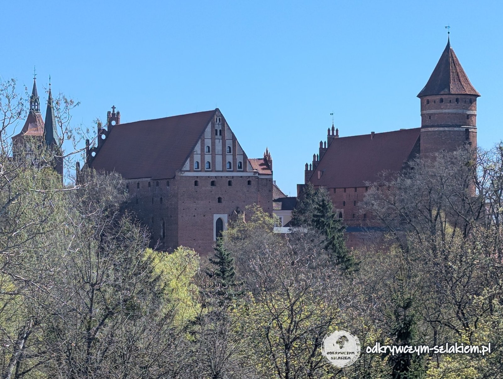 The Castle of the Warmian Chapter in Olsztyn above the Łyna valley in spring