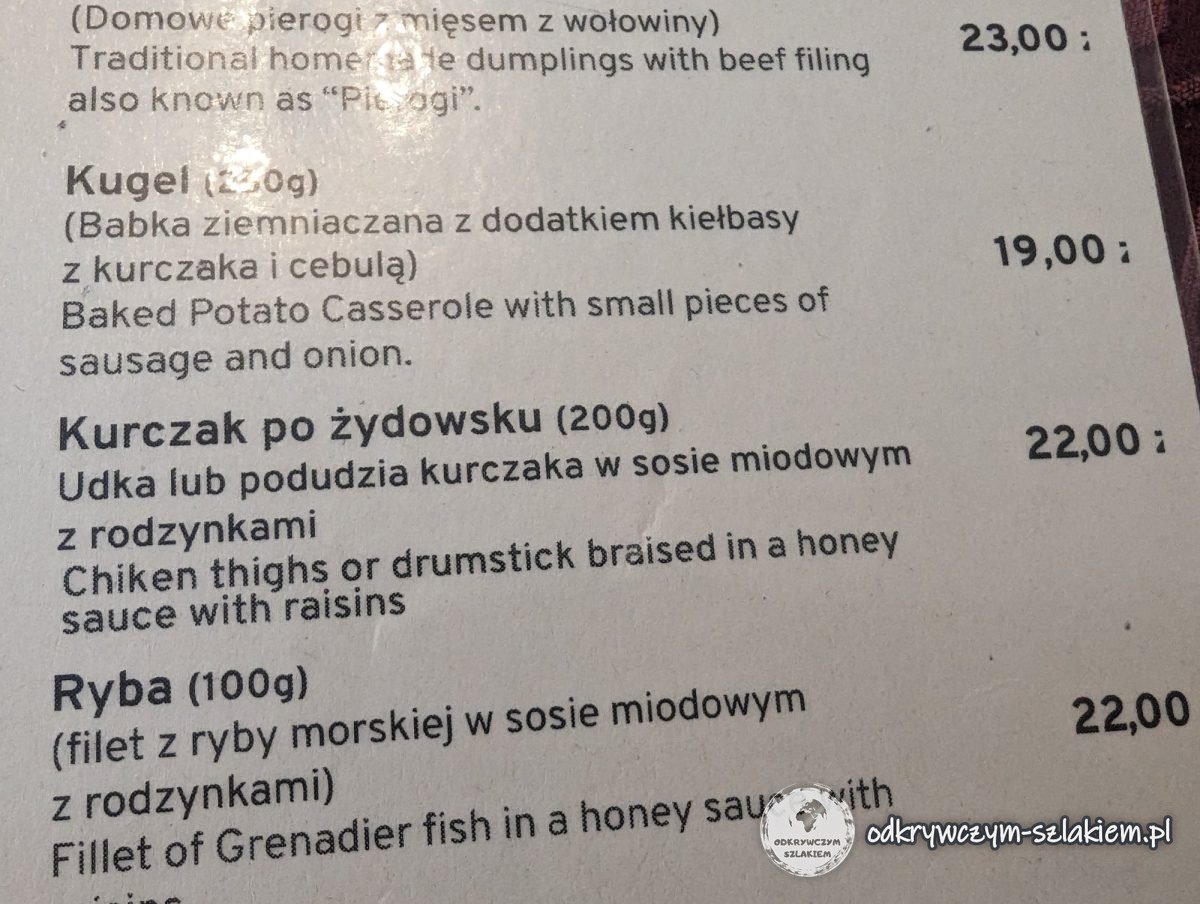 Speisekarte des Restaurants Tejsza mit Preisen für Huhn nach jüdischer Art, Kugel und Fisch