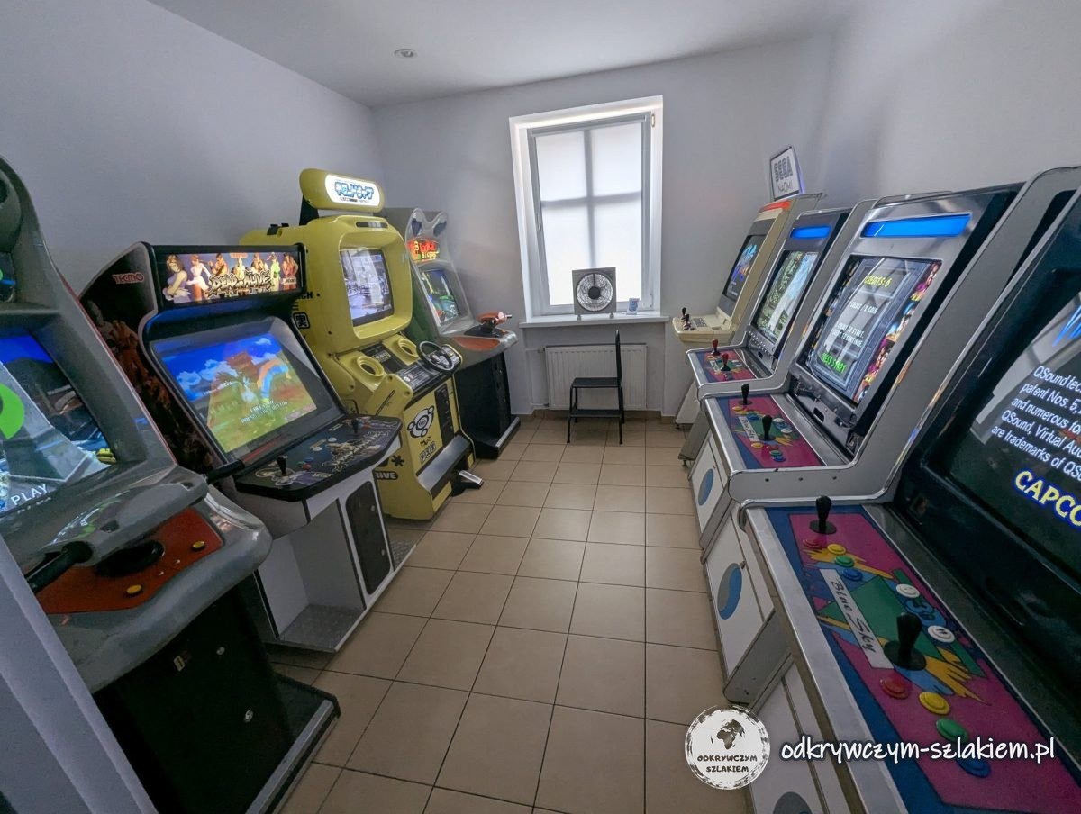 A room with classic arcade machines in the Poznań Museum of Games and Computers