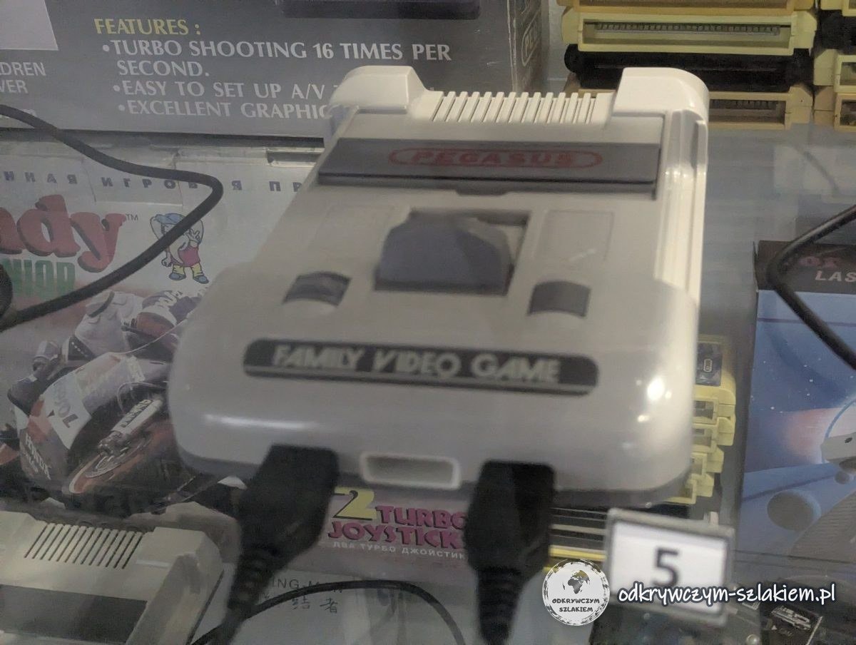 A Pegasus Family Video Game console in a display case at the Poznań Museum of Games and Computers