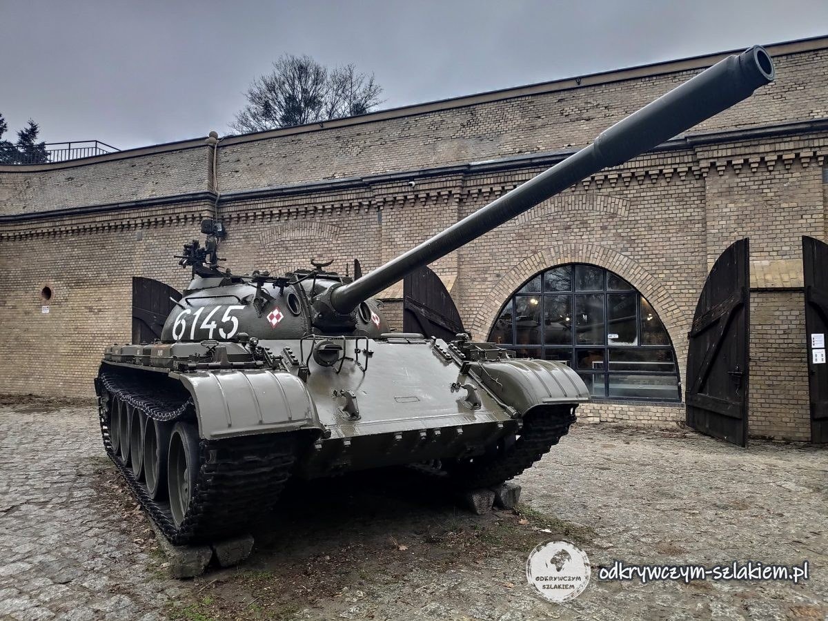 A T-55 tank in front of the brick building of the Armaments Museum at the Citadel in Poznań